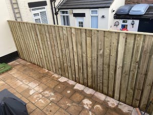 Timber overlap garden fencing installation in Liverpool